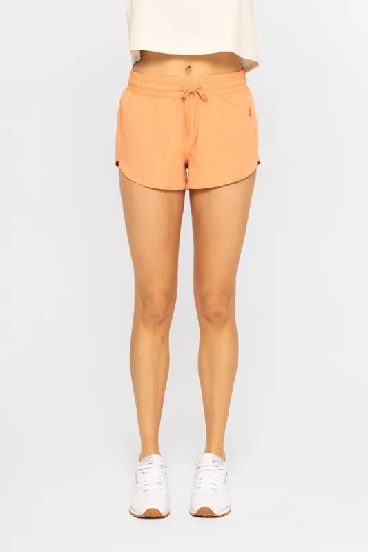 Drop Shot Drawcord Mini Shorts in Terracotta